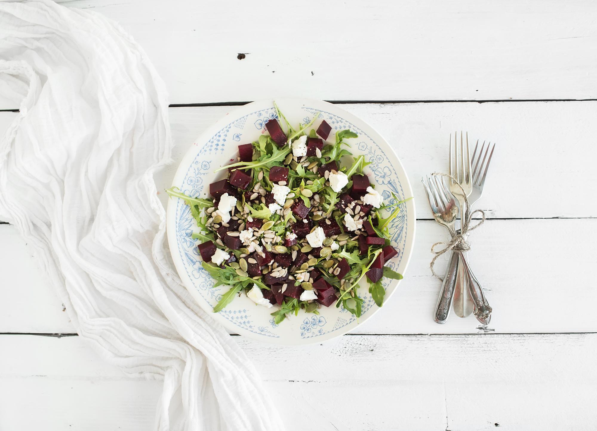 rustic plated seasonal salad with edible flowers
